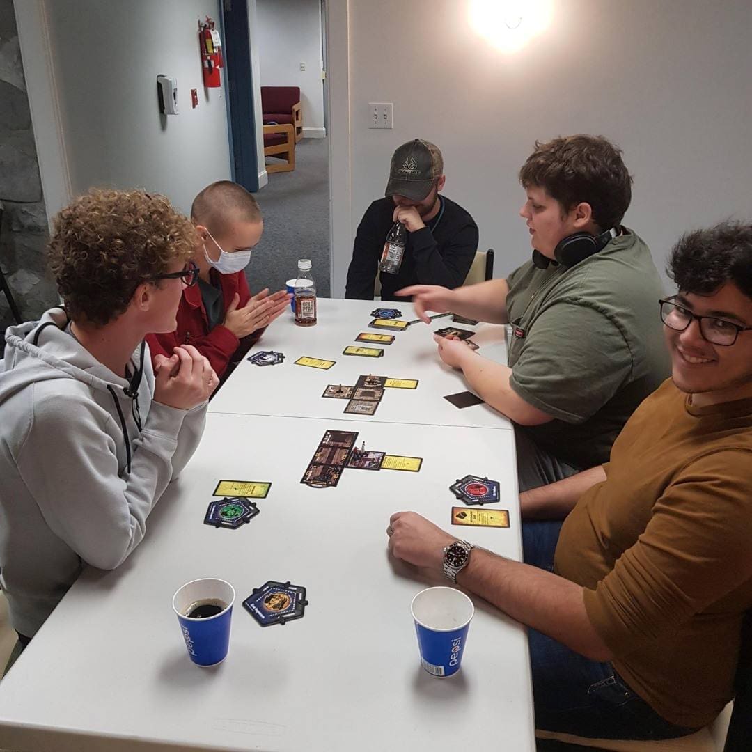 Students playing a collectable card game. 
