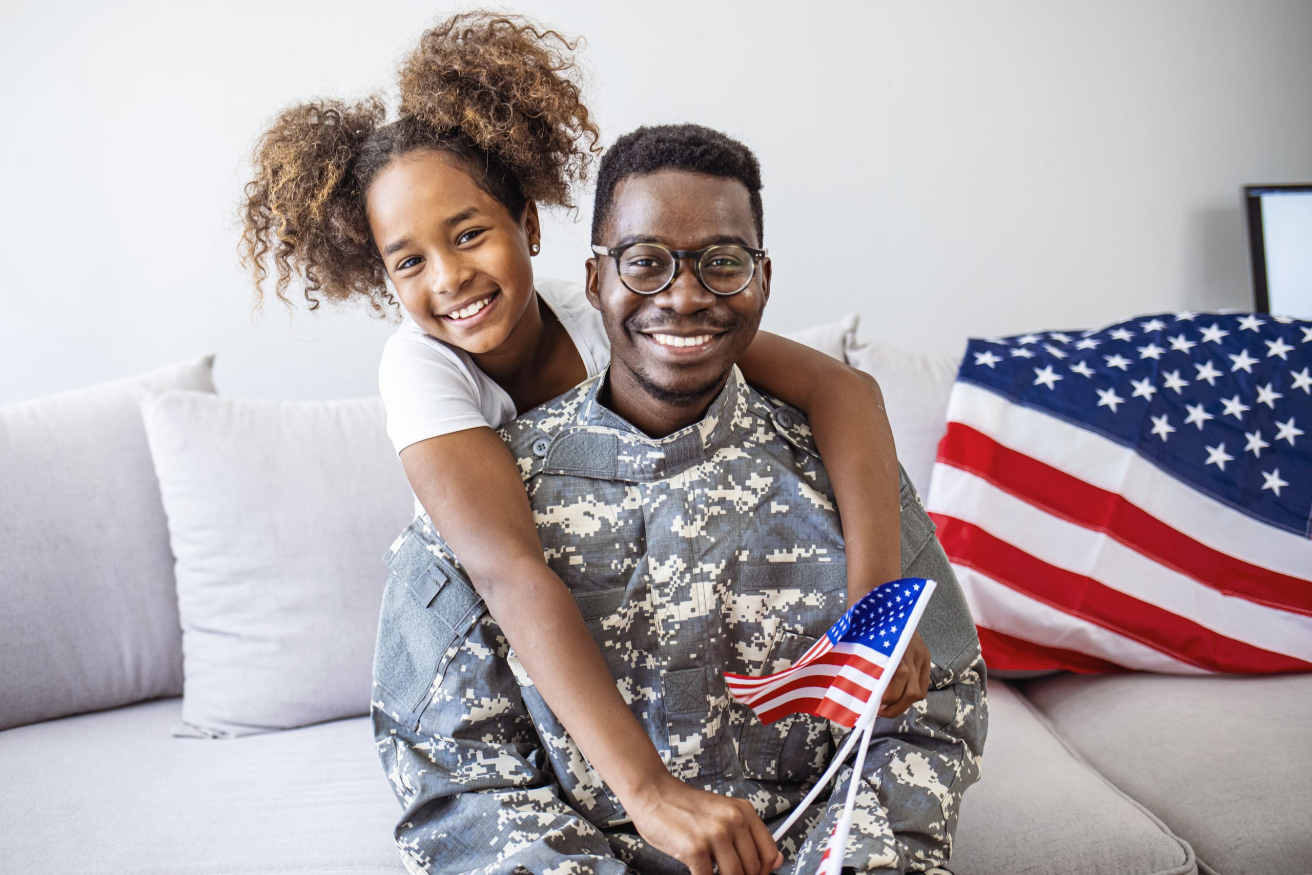 Veteran with Daughter and the American Flag 