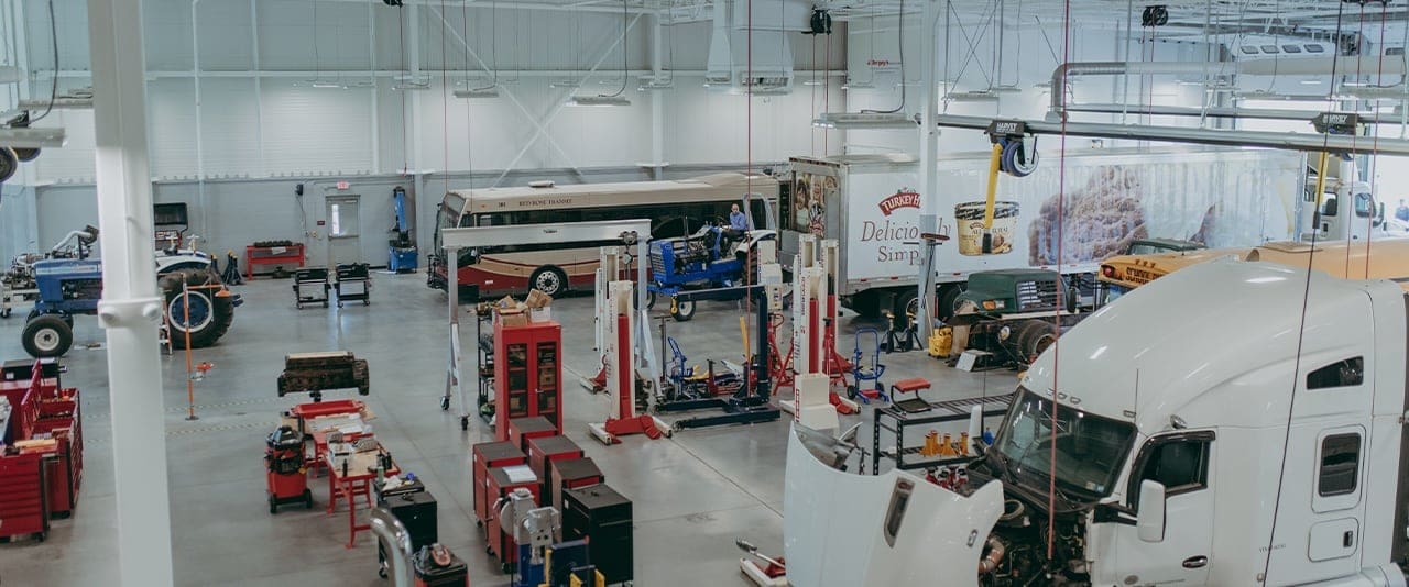 TSCT Diesel Technology overview of lab space with trucks and busses 