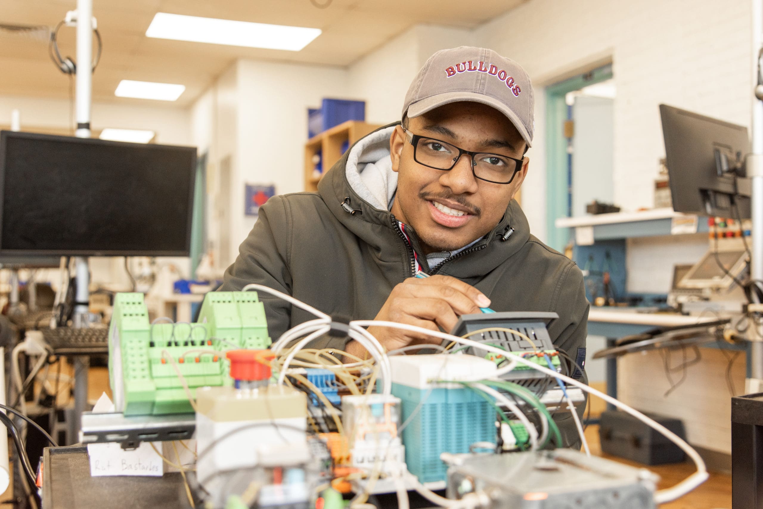 A student in the electronic engineering program hard at work in the lab space. 